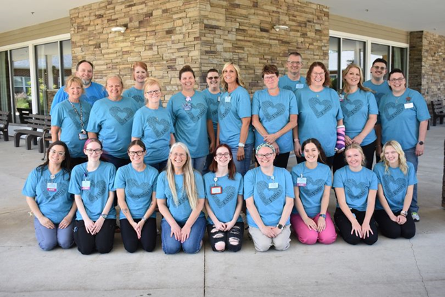 Outside Peek at the Staff with Matching Heart Shirts
